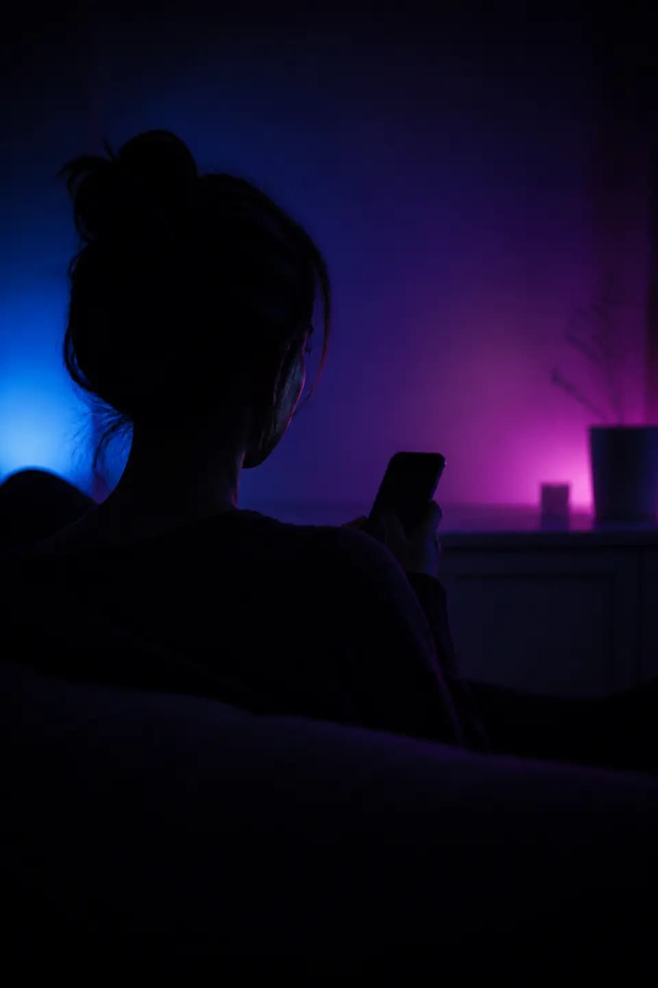 Anonymous conversation on phone in a private dark room