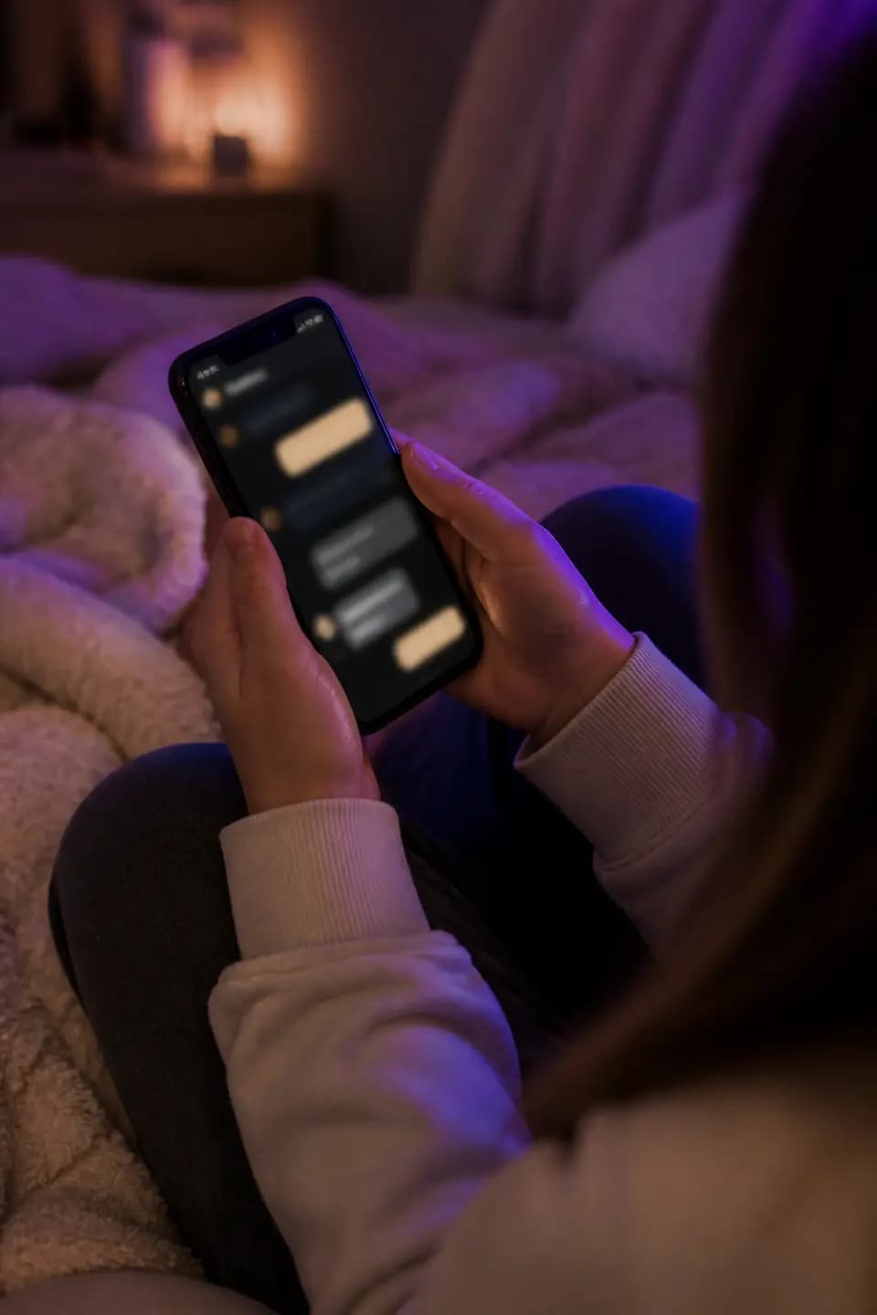 Person feeling relief while sharing thoughts on their phone