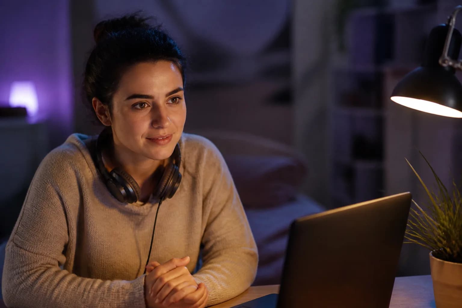 Person listening compassionately on a laptop